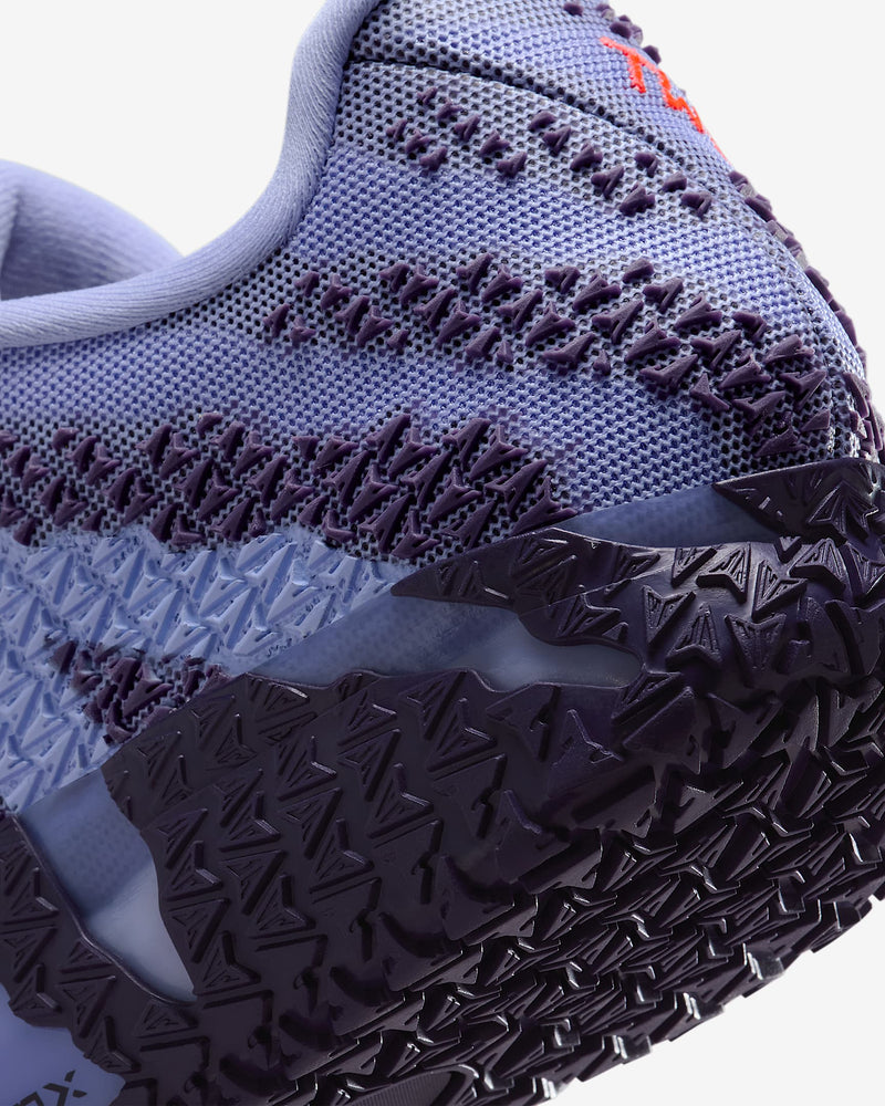Nike Ja 3 "Channel 12" basketball shoes in light purple and deep violet with textured mesh upper and detailed outsole, close-up view.