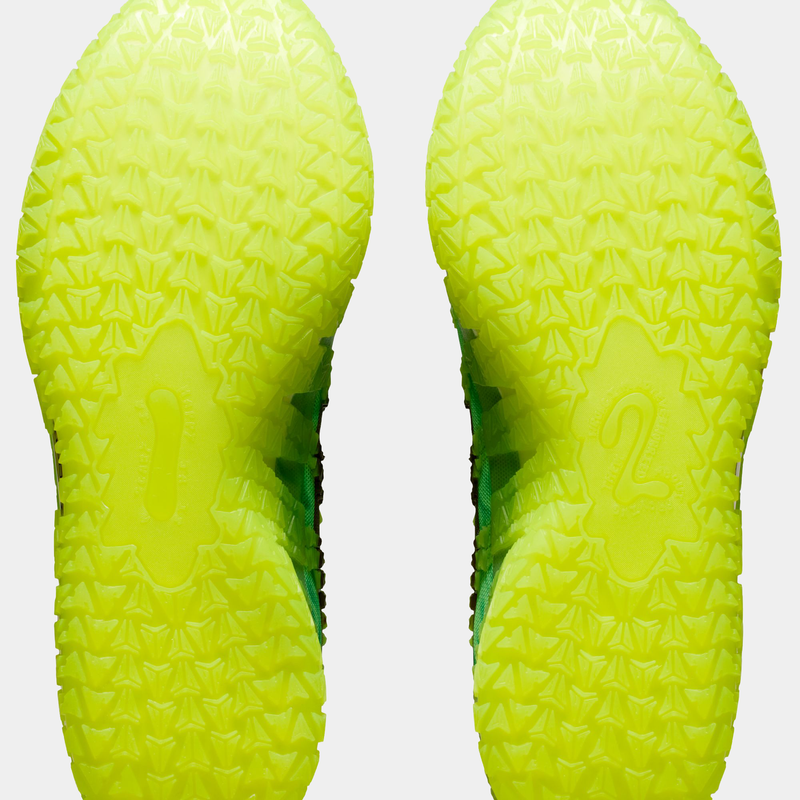 Nike Ja 3 "Halloween" basketball shoes outsole in neon green featuring a textured traction pattern and bold "1" and "2" details, sole view.