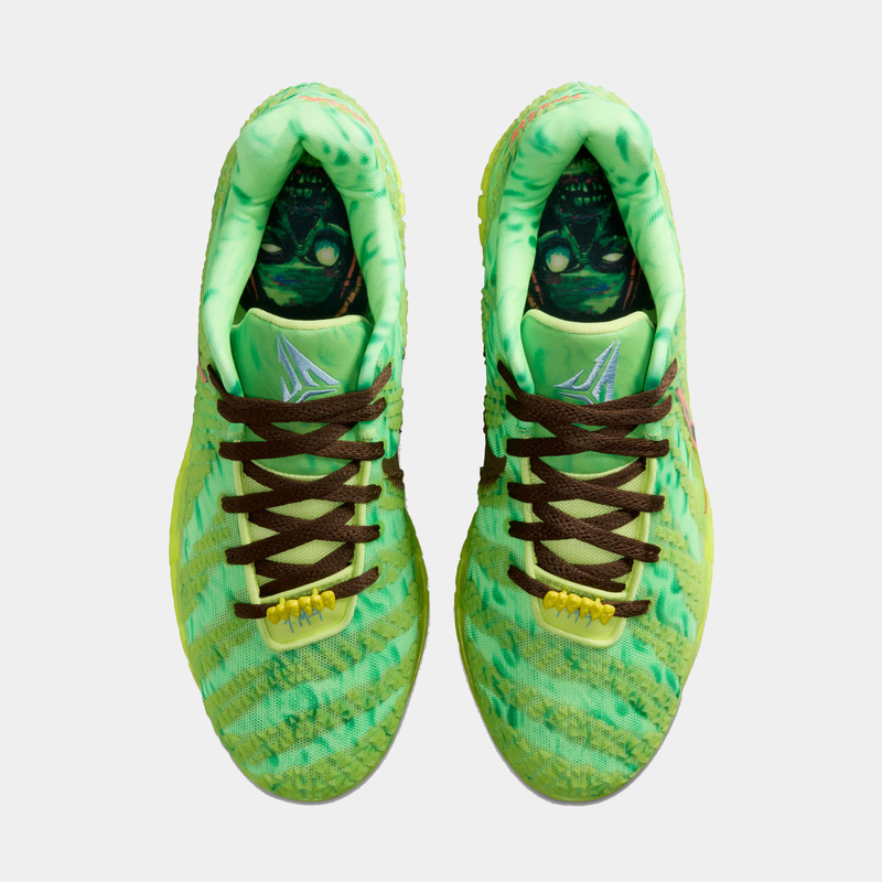 Nike Ja 3 "Halloween" basketball shoes in vibrant green with brown laces, spooky-themed sock liner graphics, top view.