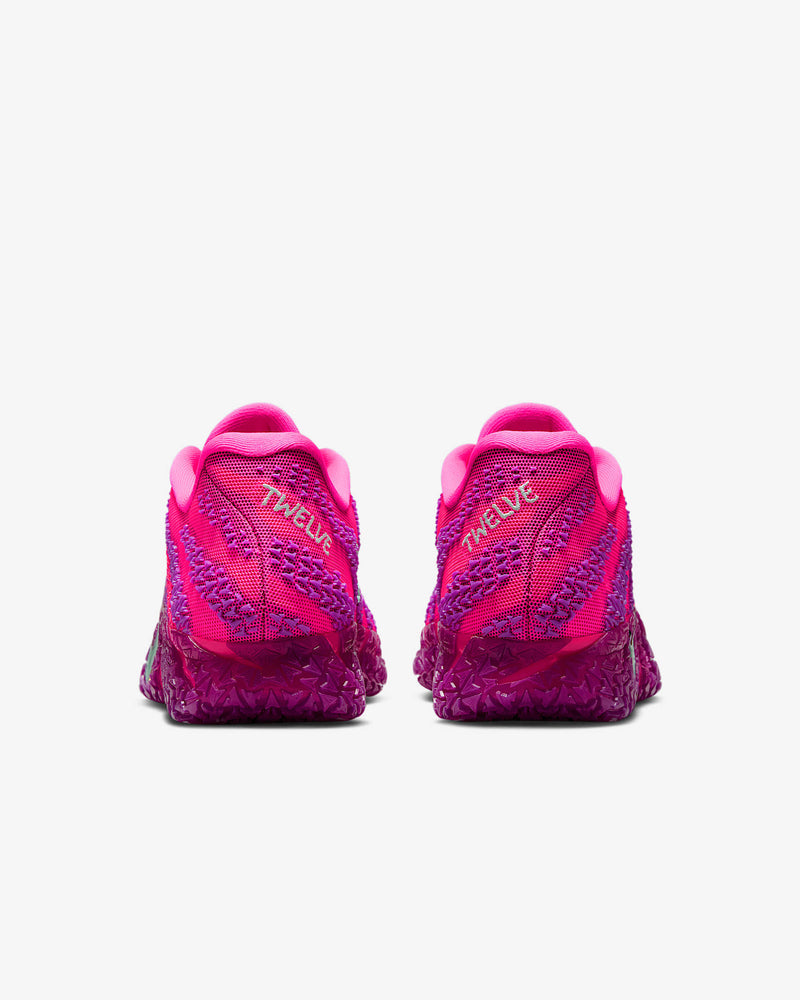 Nike Ja 3 "Price of Admission" basketball shoes in bright pink and purple with mesh upper and "Twelve" text detail, back view.