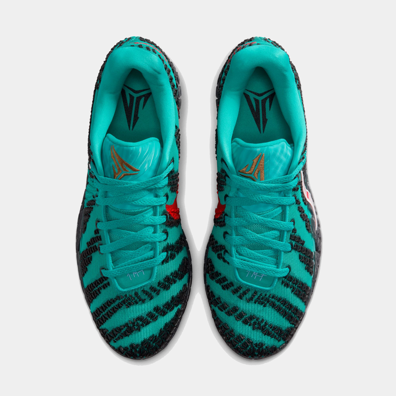 Nike Ja 3 "Scratch 3.0" basketball shoes with teal and black striped mesh upper, red Swoosh logo, and signature details, top view.