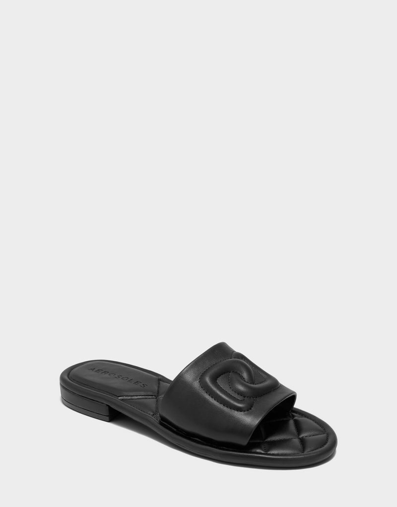 Comfortable Women's Flat Sandal in Black Faux Soft Leather, angle view
