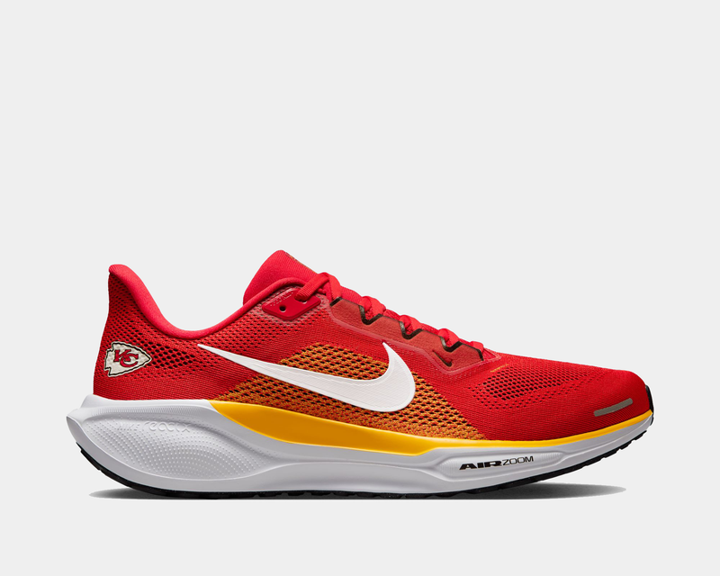Nike Kansas City Chiefs Pegasus 41 running shoes in red, yellow, and white with team logo, breathable mesh upper, and Air Zoom sole, side view.