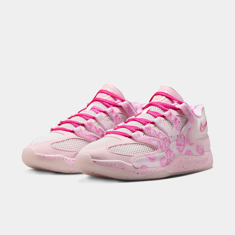 Nike KD 18 "Aunt Pearl" basketball shoes featuring a pink and white colorway, floral graphics, mesh upper, and speckled midsole, angled front view.