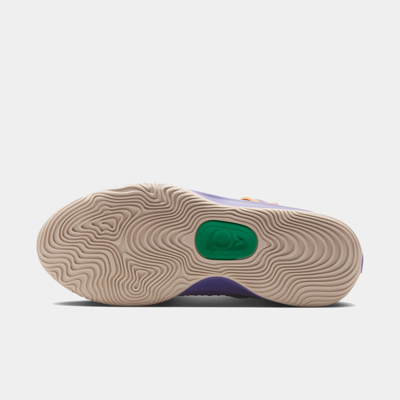 Nike KD 18 basketball shoe outsole showing wavy traction pattern in beige with green accent logo.