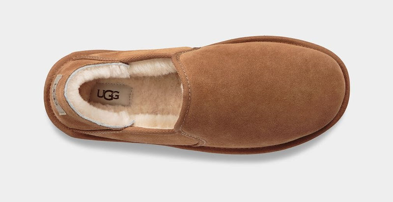 UGG Kenton slip-on shoes in chestnut brown suede with plush shearling lining, top view.
