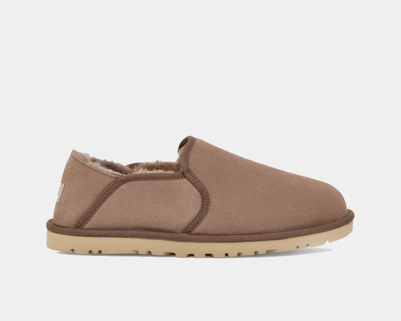 UGG Kenton slip-on shoes in light brown with suede upper, plush lining, and rubber outsole, side view.