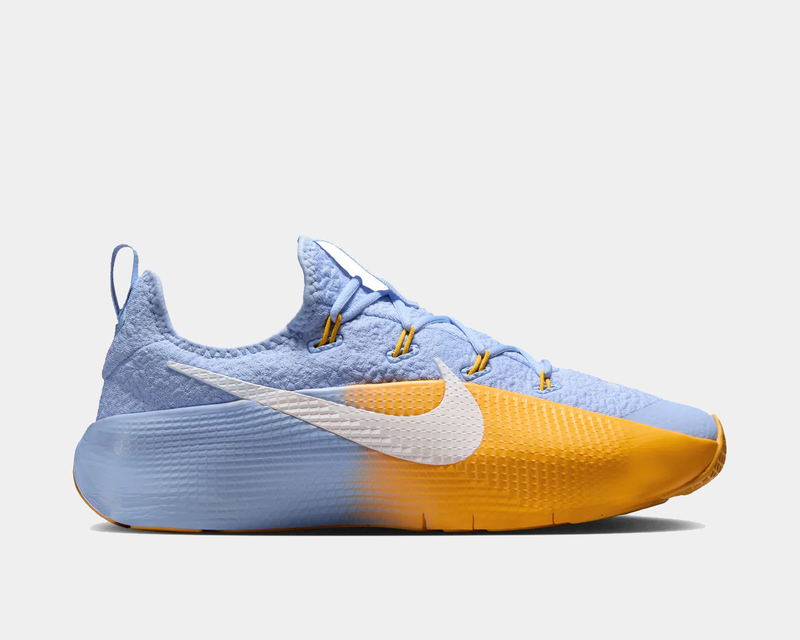 Blue and yellow sneaker with Nike logo on a light gray background