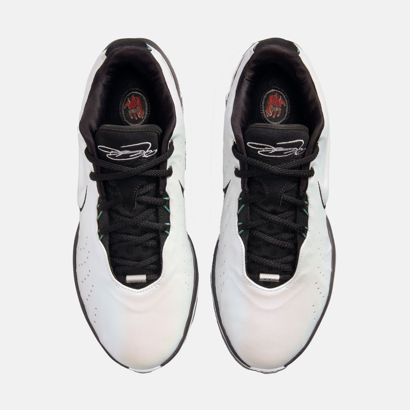 Nike Lebron XXI "Conchiolin" basketball shoes with a white iridescent upper, black laces, and signature detailing, top view.