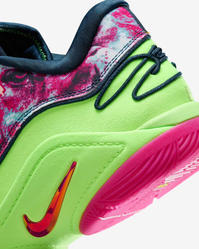 Nike LeBron XXII "Bryce's World" basketball shoes with vibrant lime green upper, pink floral accents, and red gradient Swoosh logo, side view.