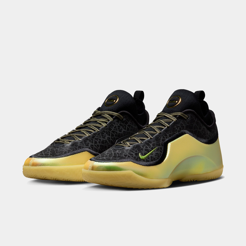 Nike LeBron XXIII Elite "Hurt Feelings" basketball shoes featuring a black textured upper, metallic gold details, and lime green accents, angled front view.