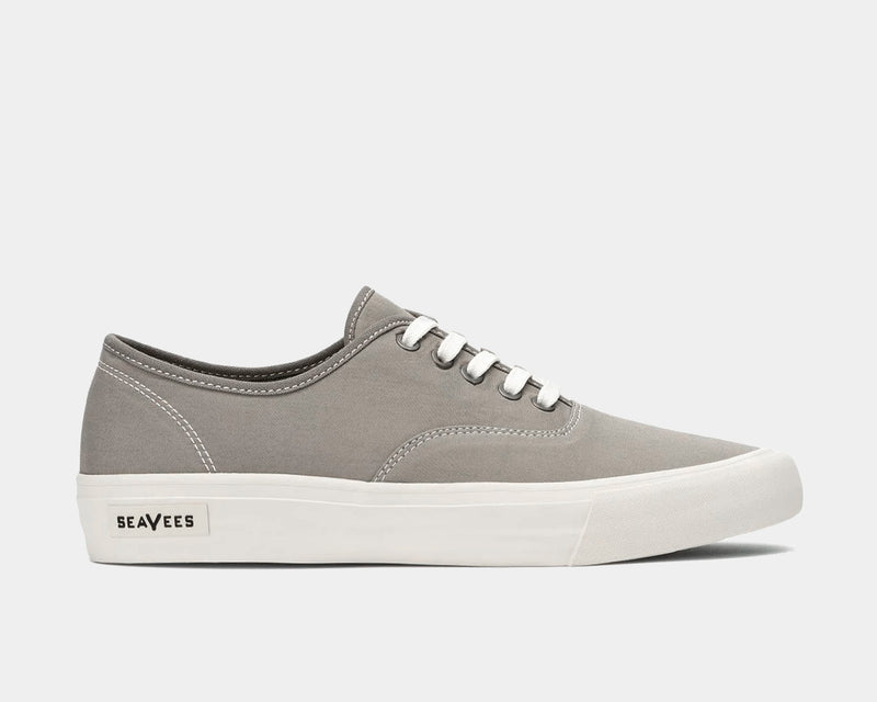 SeaVees Legend Sneaker Standard casual sneakers in gray canvas with white laces and rubber outsole, side view.