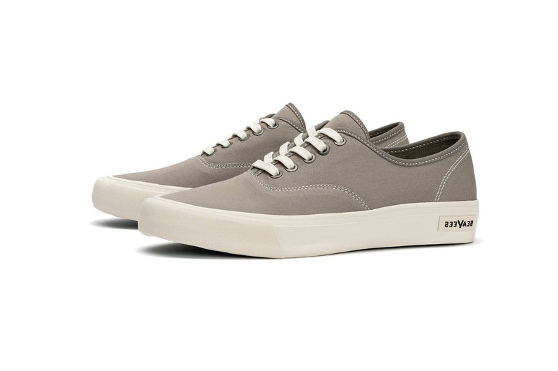 SeaVees Legend Sneaker Standard sneakers in light gray canvas with white laces and rubber sole, side angled view.
