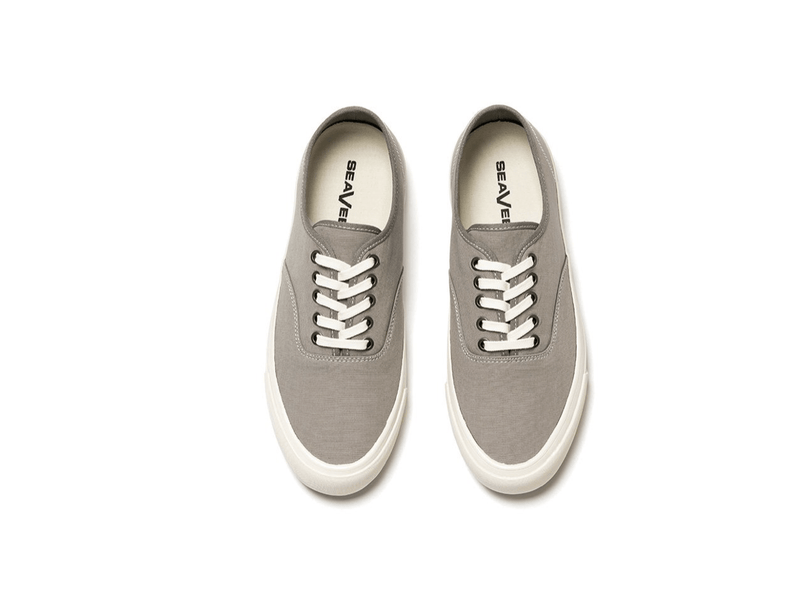 SeaVees Legend Sneaker Standard casual shoes in gray with canvas upper, white laces, and rubber outsole, top view.
