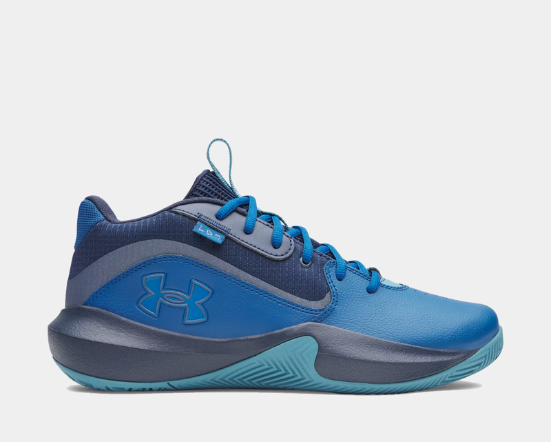Under Armour Lockdown 7 basketball shoes in blue and navy with textured upper and logo, side view.