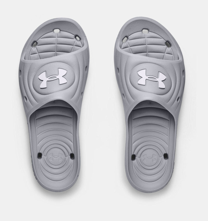 Under Armour Locker IV SL slides in gray with textured footbed, molded details, and logo accent, top view.
