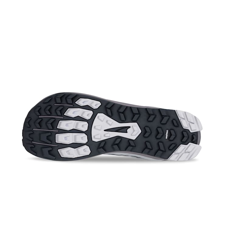 Altra Lone Peak 9 trail running shoes outsole in black and white with multi-directional lugs for enhanced traction, bottom view.