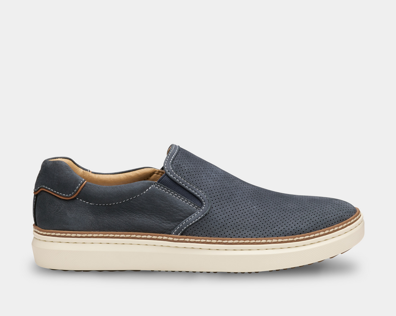 Johnston & Murphy McGuffey 2 Perfed Slip-On shoes in navy blue leather with perforated design, side view.