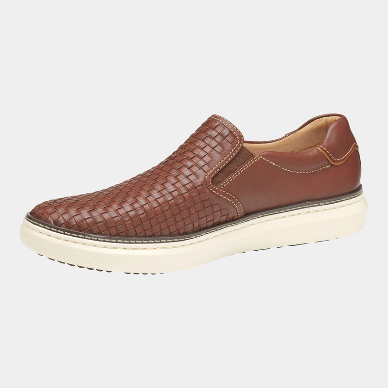 Johnston & Murphy McGuffey 2 Woven Slip-on shoes in brown leather with woven design and white sole, side view.