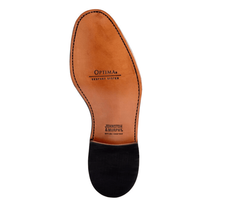 Johnston & Murphy Melton Cap Toe dress shoe sole view showing Optima Comfort System and stitched leather outsole in tan and black.