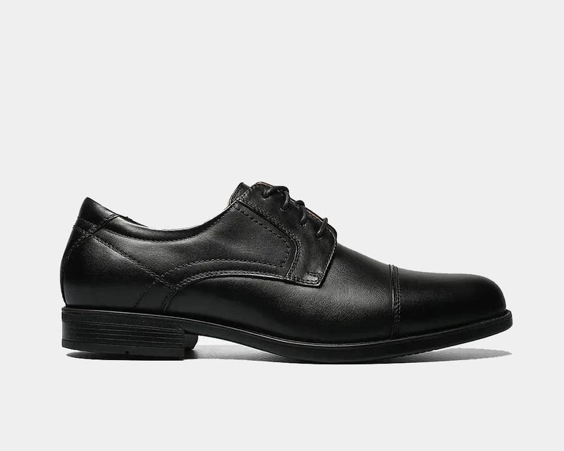 Florsheim Midtown Cap Oxford dress shoes in black leather with cap toe design and stacked heel, side view.
