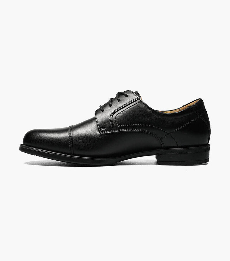 Florsheim Midtown Cap Oxford dress shoes in black leather with a cap toe design and lace-up closure, side view.