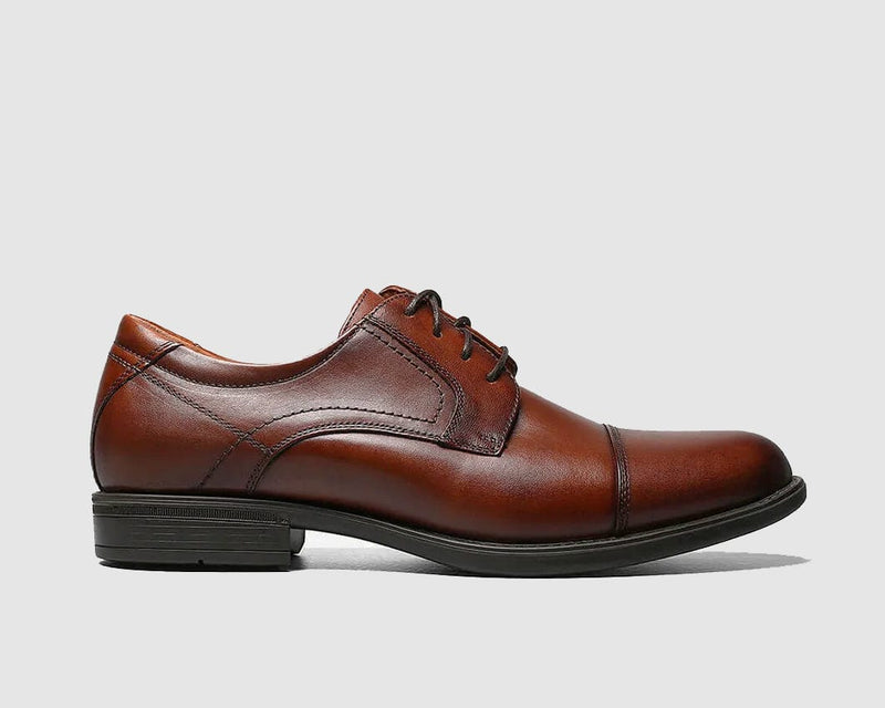 Florsheim Midtown Cap Oxford dress shoes in brown leather with cap toe design and lace-up closure, side view.