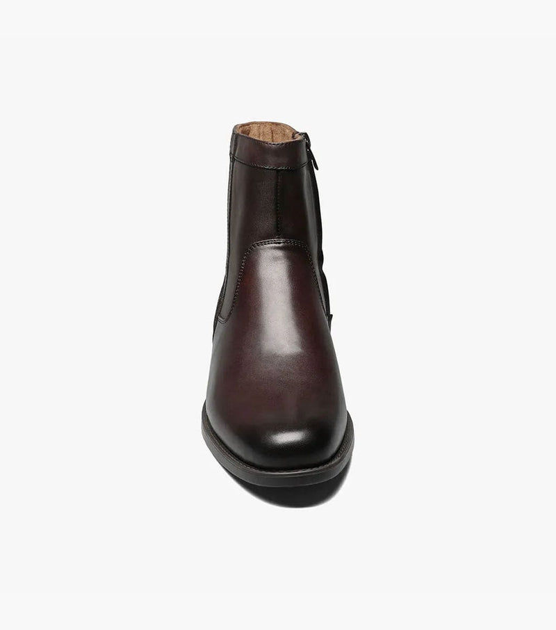 Florsheim Midtown PT Zipper Boot front view in dark brown leather with sleek polished finish and side zipper detailing.