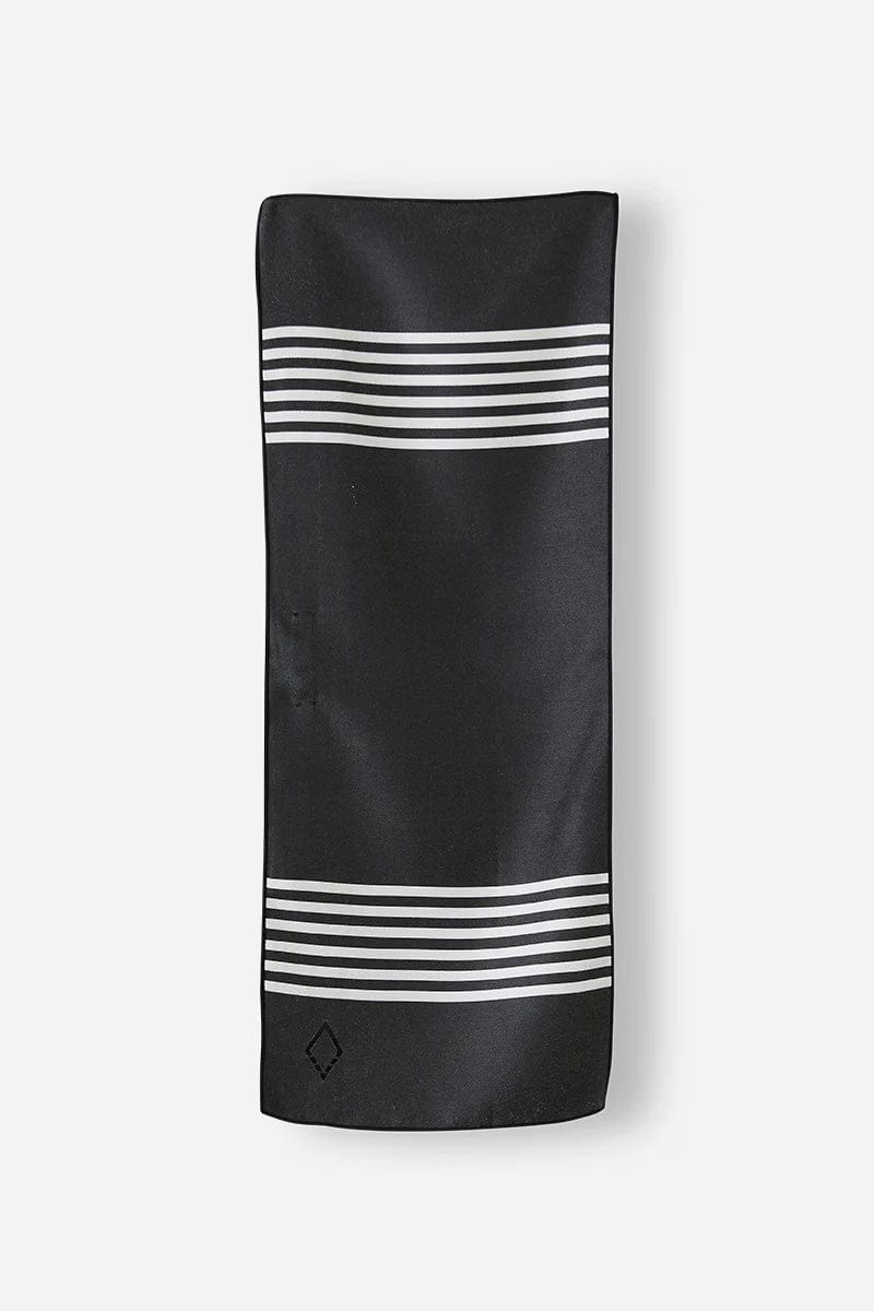 Nomadix Mini Towel in black with white horizontal stripe accents, lightweight and compact design, flat front view.