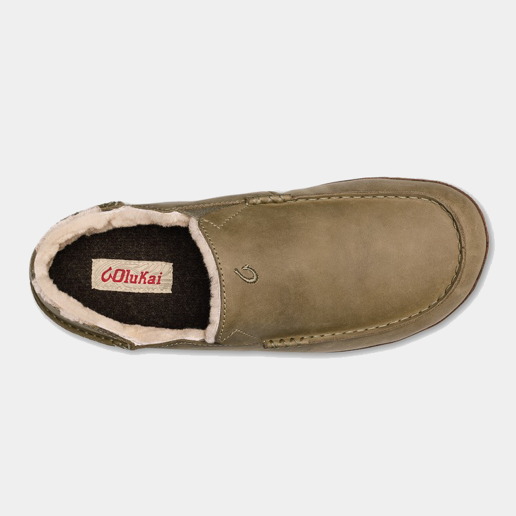 OluKai Moloa Slipper in tan leather with soft shearling lining and embroidered logo detail, top view.