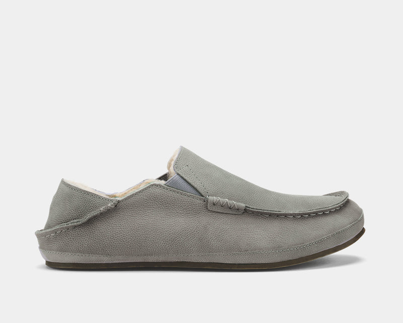 OluKai Moloa Slipper casual shoes in gray premium suede with moc-toe stitching and foldable heel, side view.