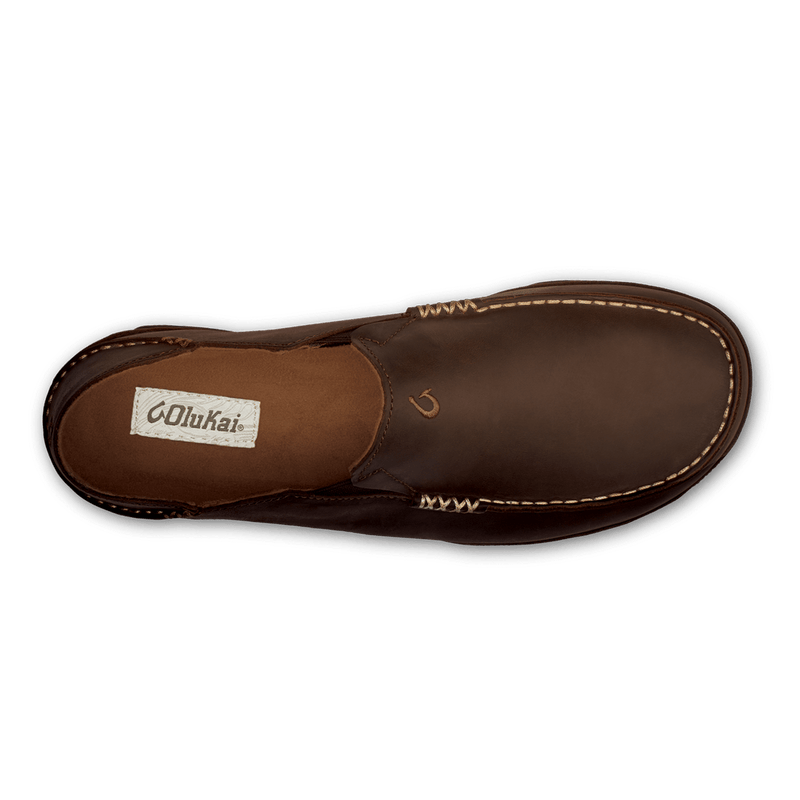 OluKai Moloa shoe in dark brown leather with contrast stitching and logo detail, top view.