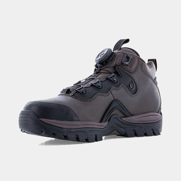 DC WorkCrew Navigator Work Hi Top Comp Toe with Met Guard boots in dark brown leather with a reinforced toe cap and rugged black outsole, angled side view.