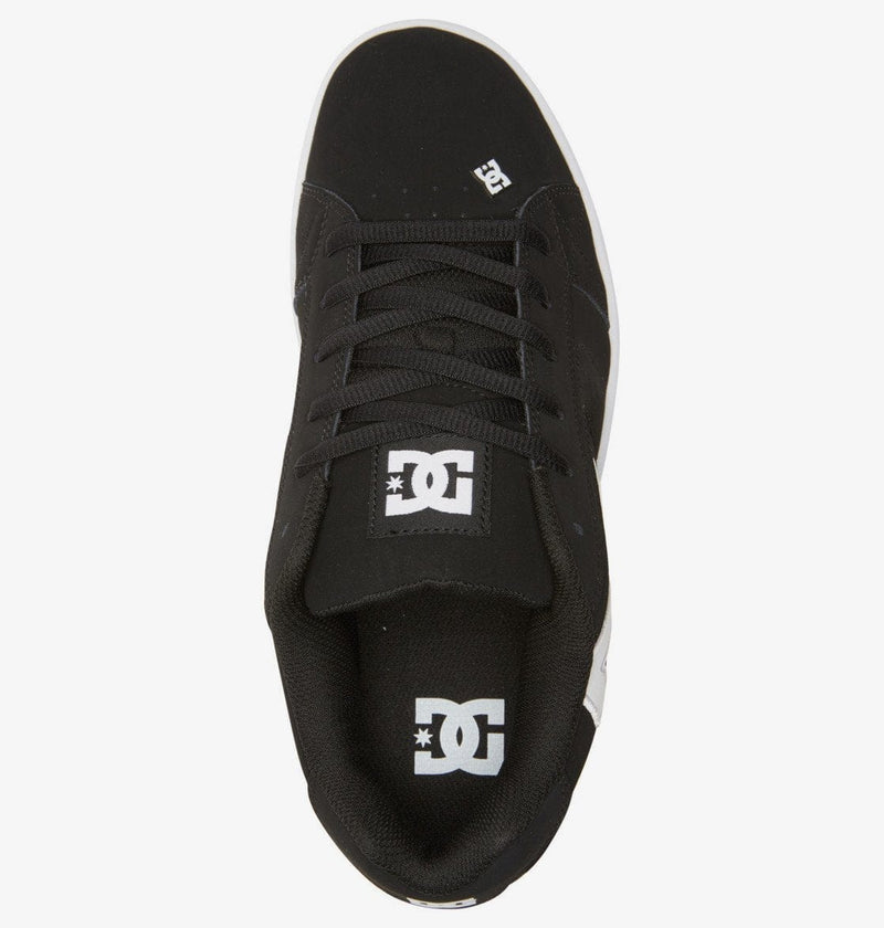 DC Footwear Net skate shoes in black with white branding on the tongue and toe box, top view showing lace-up closure and padded collar.