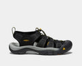 Keen Newport H2 sandals in black with durable webbing upper, bungee lace system, and sturdy rubber outsole, side view.