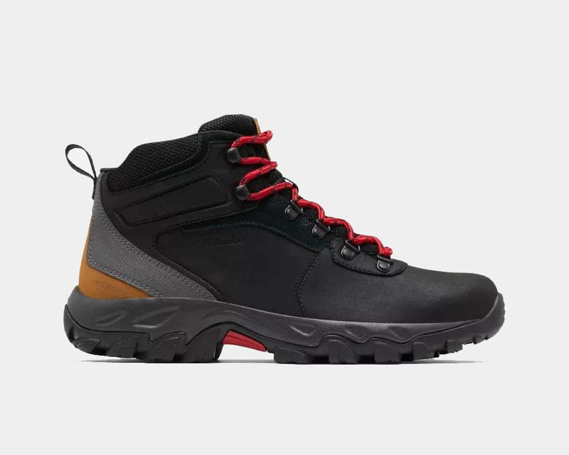 Columbia Newton Ridge Plus II Waterproof hiking boots in black, gray, and tan with red laces and rugged outsole, side view.