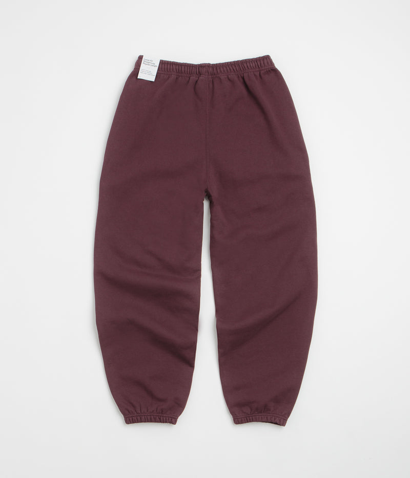 Nike Solo Swoosh Cuffed Sweatpants in Burgundy Crush and Burgundy Crush / White