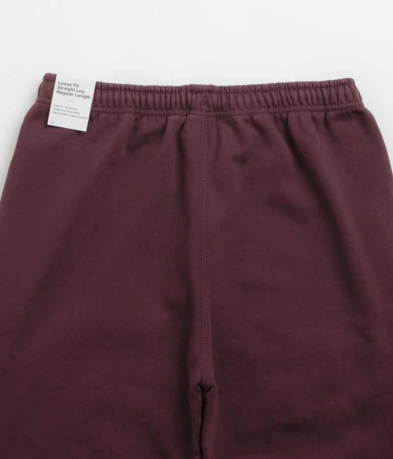 Nike Solo Swoosh Cuffed Sweatpants in Burgundy Crush and Burgundy Crush / White