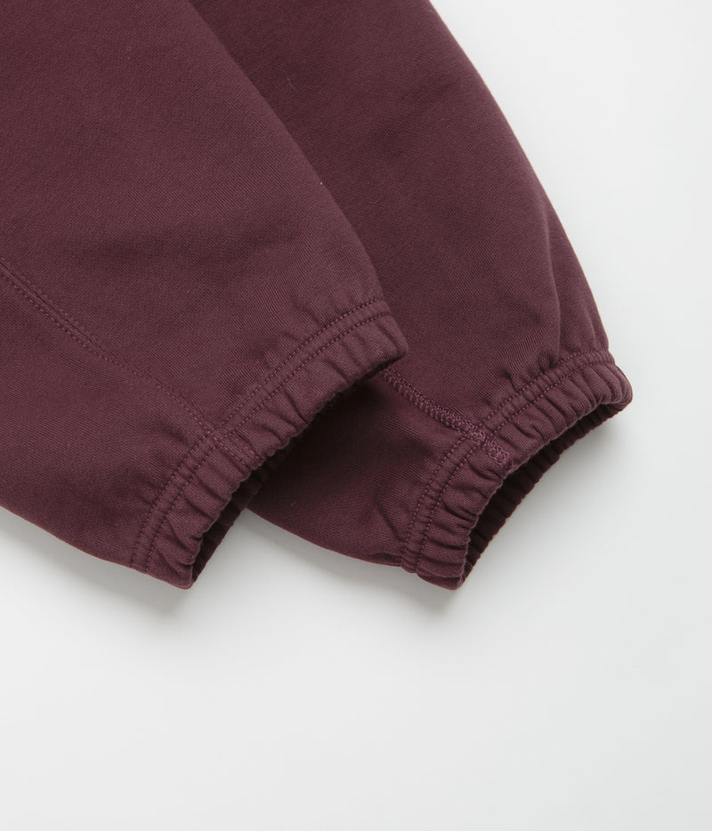 Nike Solo Swoosh Cuffed Sweatpants in Burgundy Crush and Burgundy Crush / White