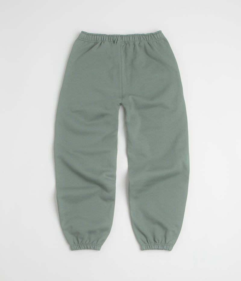 Nike Solo Swoosh Cuffed Sweatpants in Clay Green and Clay Green / White