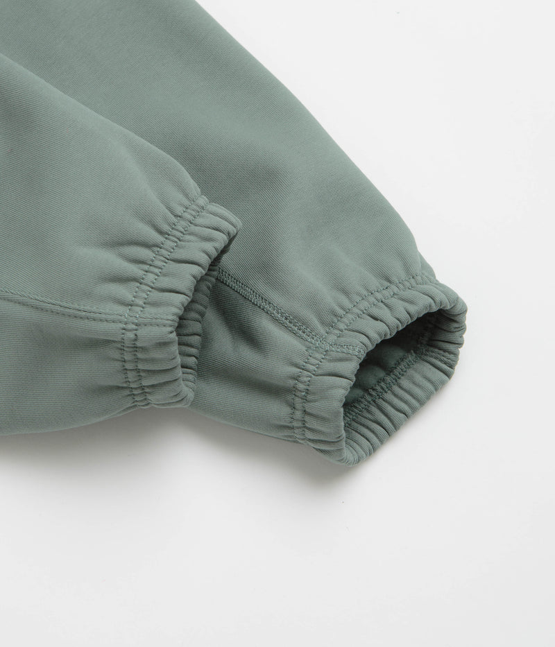 Nike Solo Swoosh Cuffed Sweatpants in Clay Green and Clay Green / White