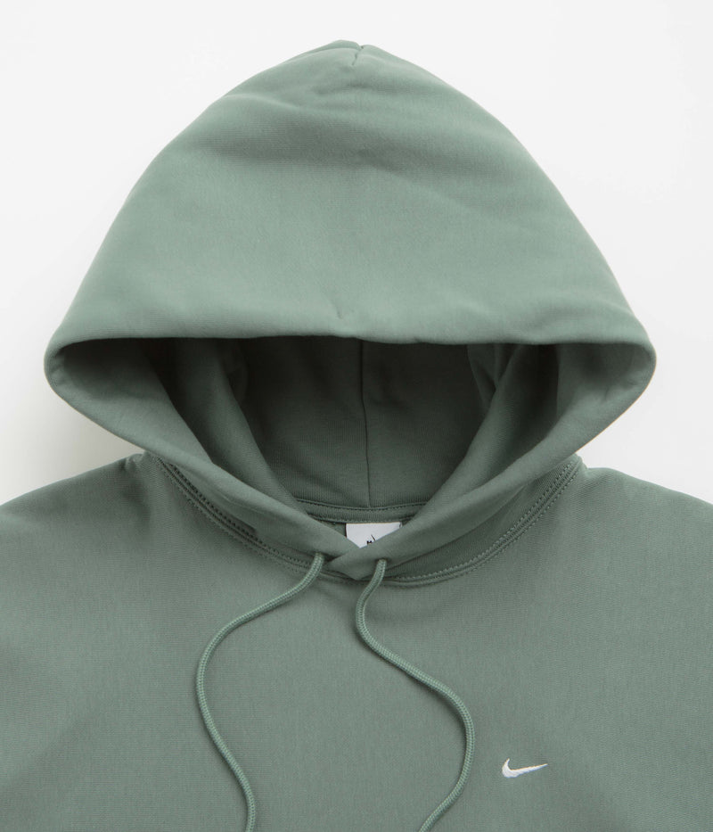Nike Solo Swoosh Hoodie in Clay Green and Clay Green / White