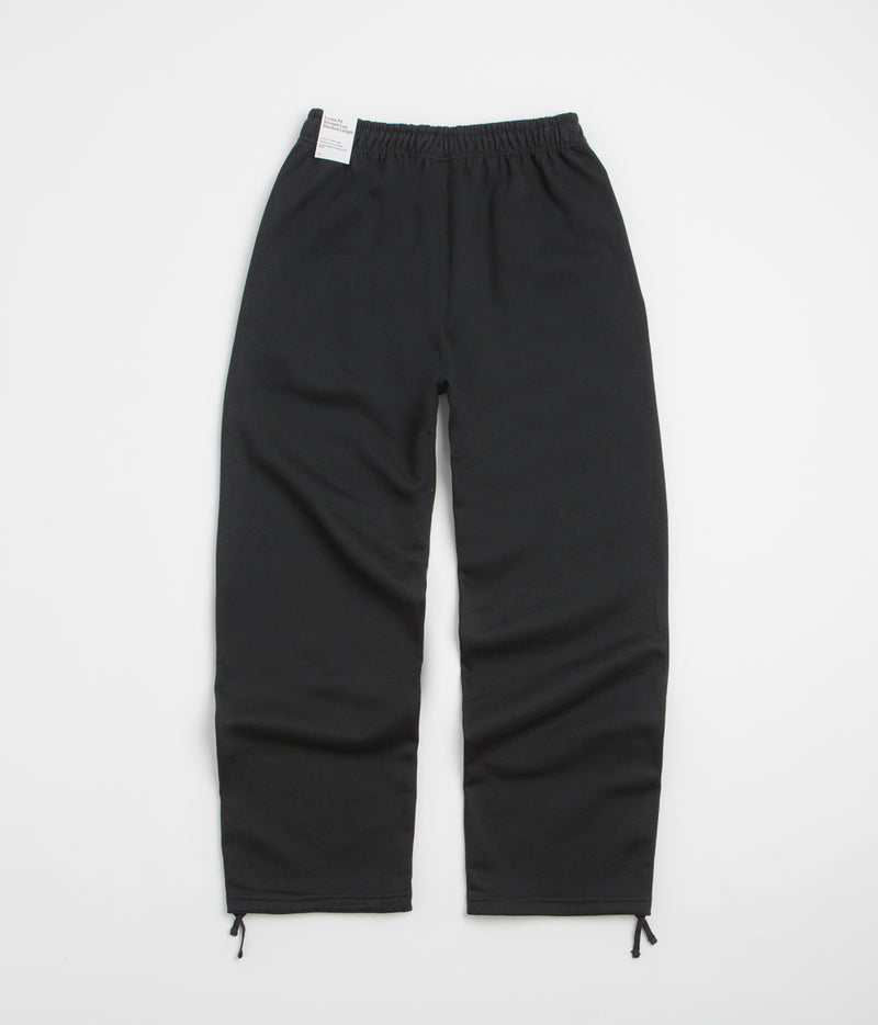 Nike Solo Swoosh Open Hem Sweatpants in Black and Black / White