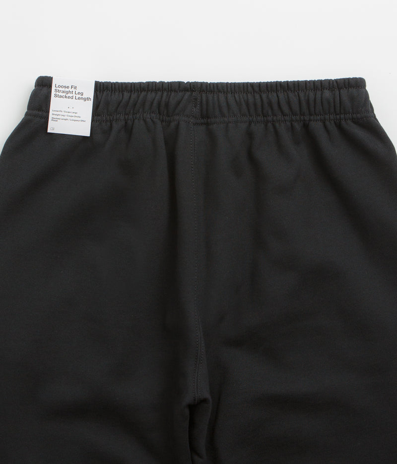 Nike Solo Swoosh Open Hem Sweatpants in Black and Black / White
