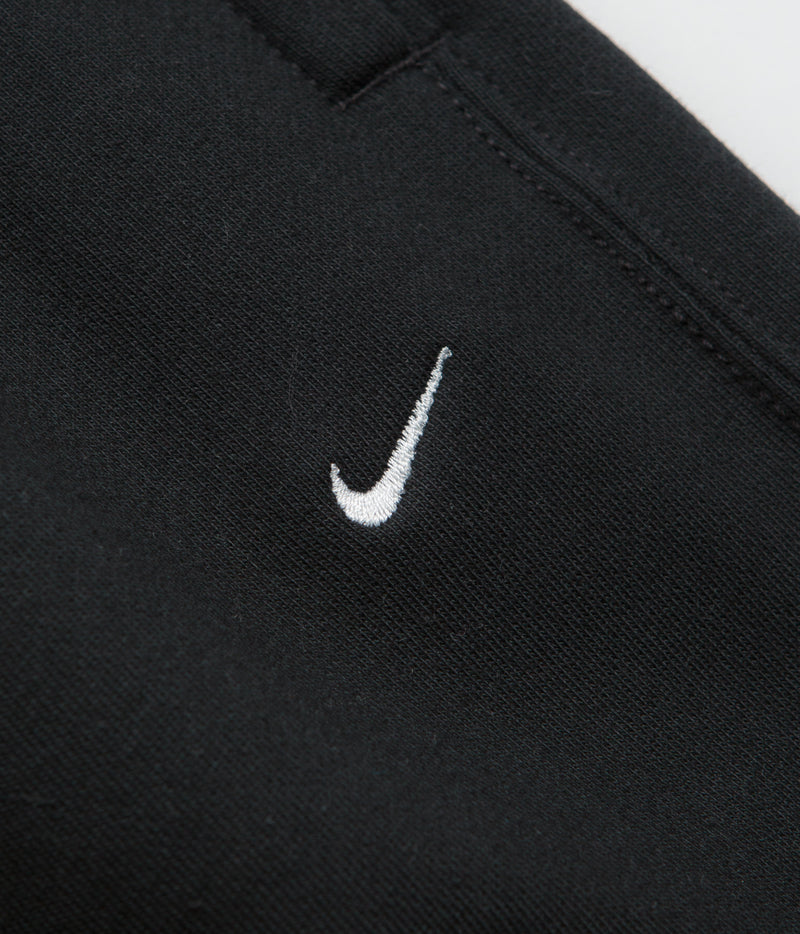 Nike Solo Swoosh Open Hem Sweatpants in Black and Black / White