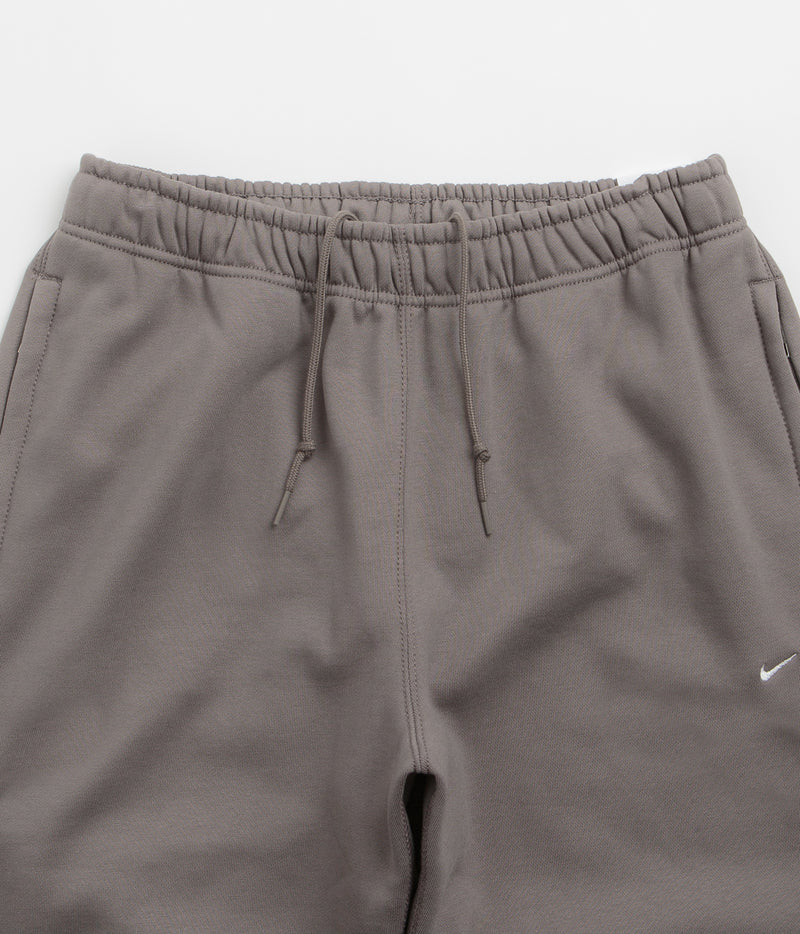 Nike Solo Swoosh Open Hem Sweatpants in Cave Stone and Cave Stone / White