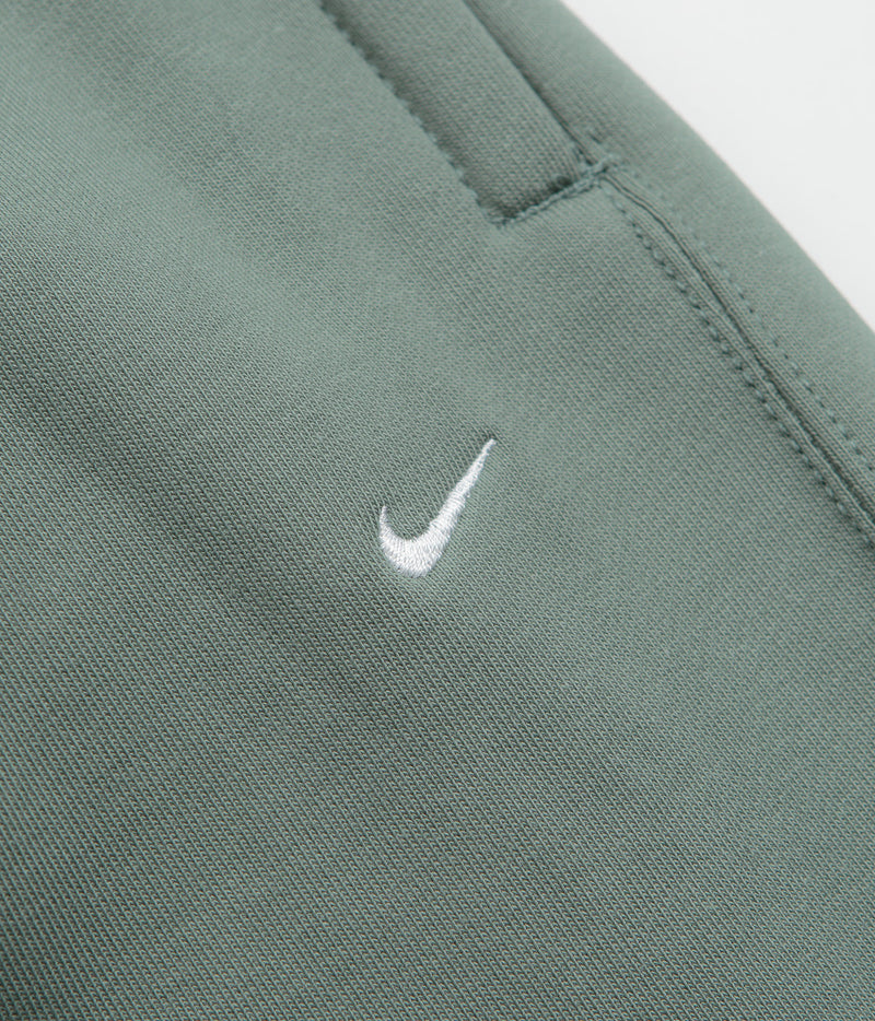 Nike Solo Swoosh Open Hem Sweatpants in Clay Green and Clay Green / White