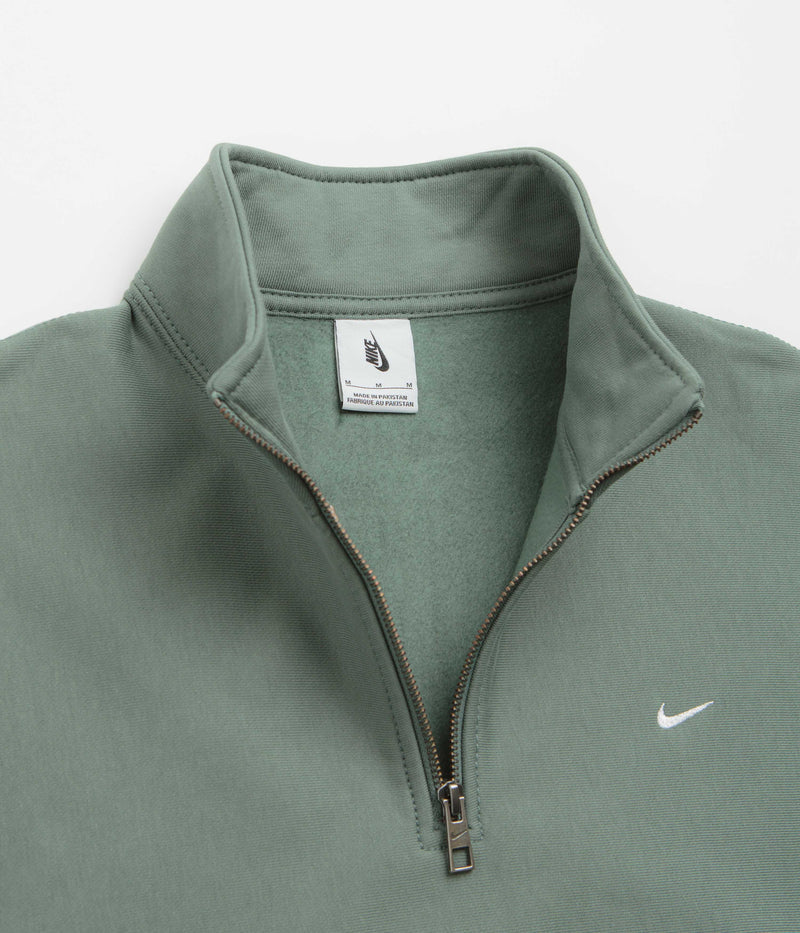 Nike Solo Swoosh Quarter Zip Sweatshirt in Clay Green and White