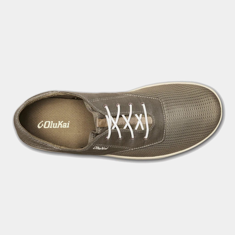 OluKai Nohea Moku shoes in dark brown with breathable mesh upper, white laces, and tan footbed, top view.