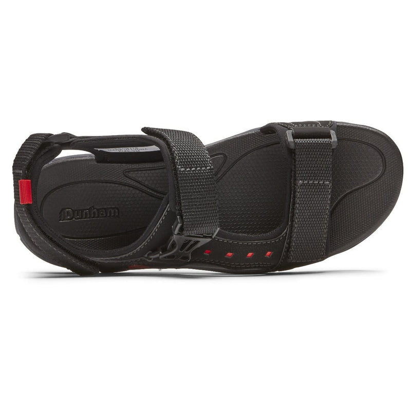 Dunham Nolan Water Friendly Sandal in black with adjustable straps, textured footbed, and subtle red accents, top view.
